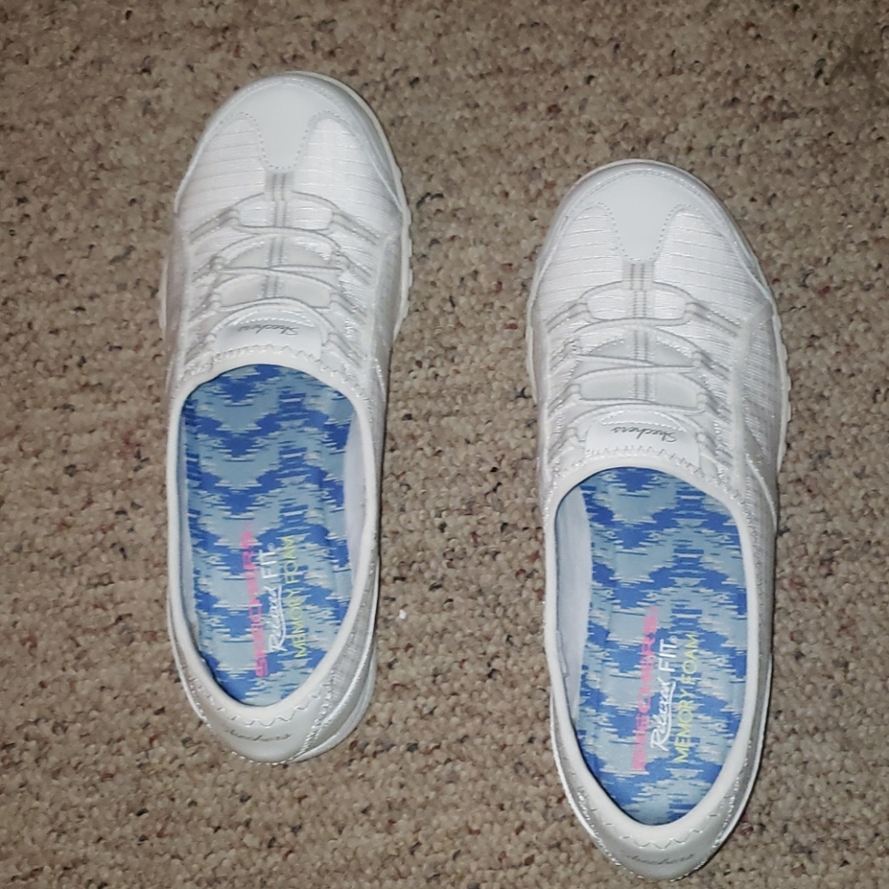 White slip on Skechers